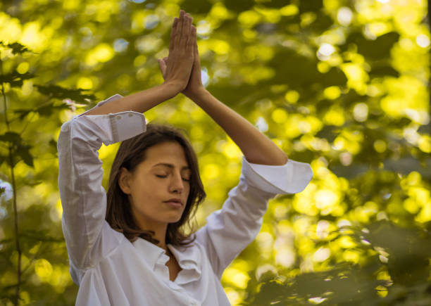 istock Spring season is time for yoga in nature. 1009637372