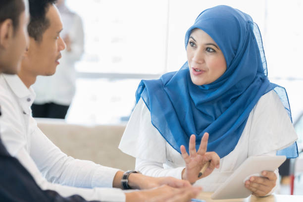 istock Malaysian businesswoman during client presentation 1009647226