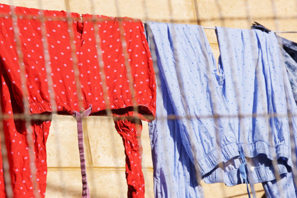 istock Washed Pajama Clothing Hanging Clothesline Drying 1009650274