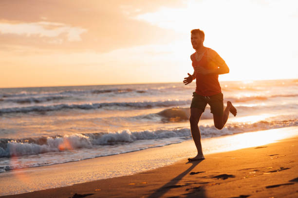 istock Male runner by the sea 1009651078