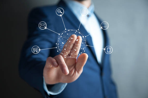 istock man holding social media network in screen 1009659150