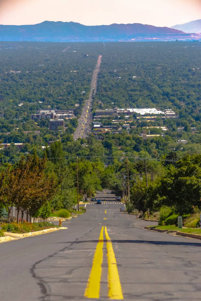 istock Looking down a street with double yellow lines 1009672068