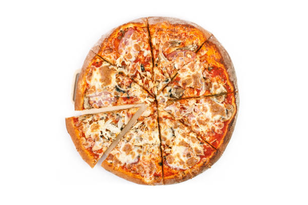 istock Pizza with ham pepper and cheese on a black stone background 1009679630