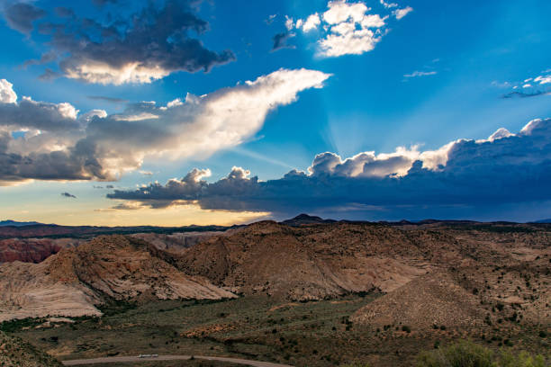 istock The Sun Shines Through the Clouds Over Snow Canyon 1009688890