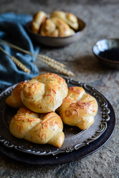 istock Cheesy knots with black cumin 1009705974