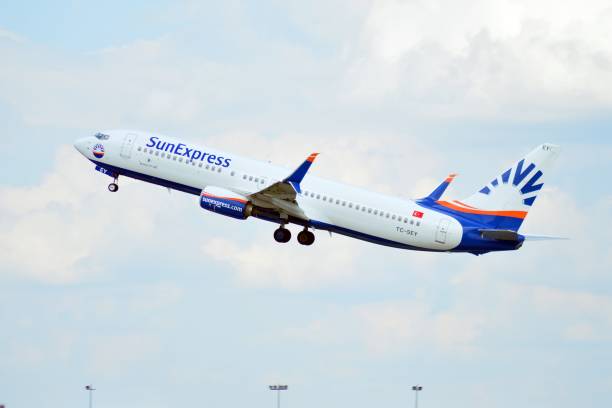 Airplane  TC-SEY SunExpress Boeing 737-8HC(WL) taking off from the Warsaw Chopin Airport. Warsaw, Poland. 26 July 2018. Airplane  TC-SEY SunExpress Boeing 737-8HC(WL) taking off from the Warsaw Chopin Airport. sunexpress stock pictures, royalty-free photos & images