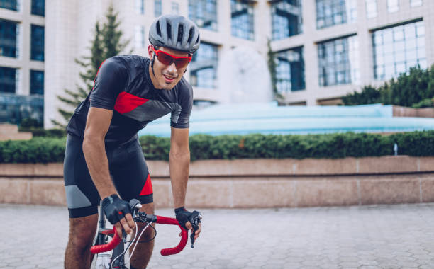 istock Guy in city on racing bicycle 1009749504