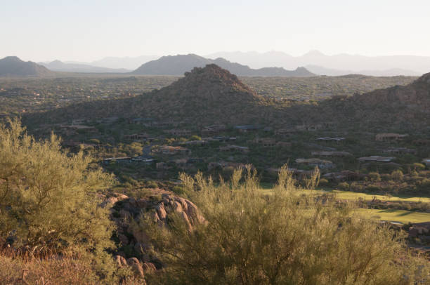 istock Pinnacle Peak Park as sun rises over cactus and hiking trails. 1009759614
