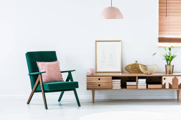 istock Pink and green living room 1009764550