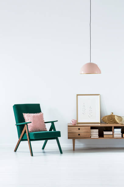 istock Green and pink living room 1009776774