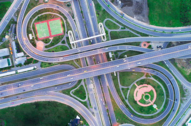 istock Aerial view network or intersection of highway road for transportation or distribution concept background. 1009784692