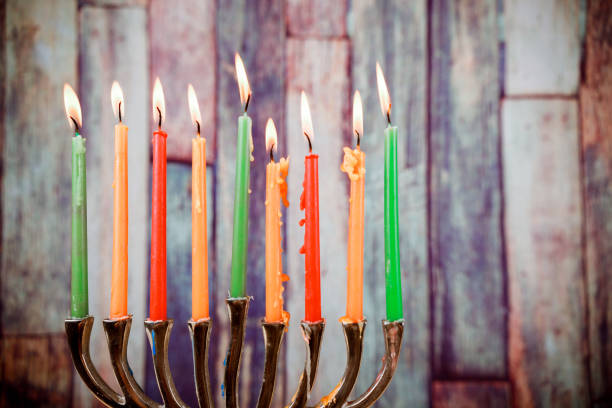istock Brightly Glowing Hanukkah Menorah - Shallow Depth of Field 1009789792