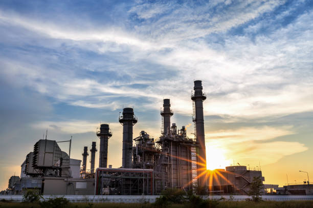 elektrownia cyklu cyklu gazowego z zachodu słońca - fuel and power generation nuclear power station tower pollution zdjęcia i obrazy z banku zdjęć
