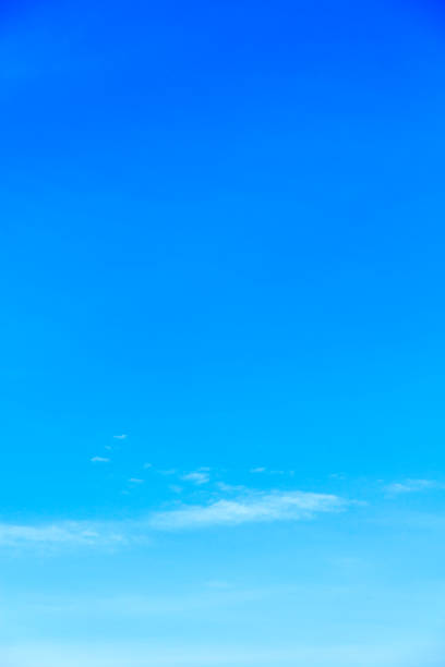 istock Blue sky background and white clouds soft focus, and copy space 1009800926
