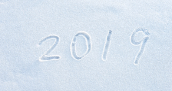 New year 2019 written on the snow.