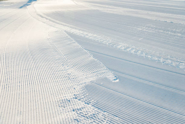 Newly groomed ski slope background.