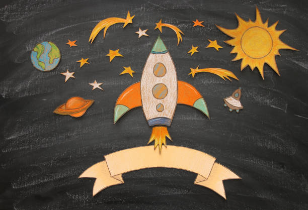 istock Back to school concept. rocket, space elements shapes cut from paper and painted over classroom blackboard background. 1009838932