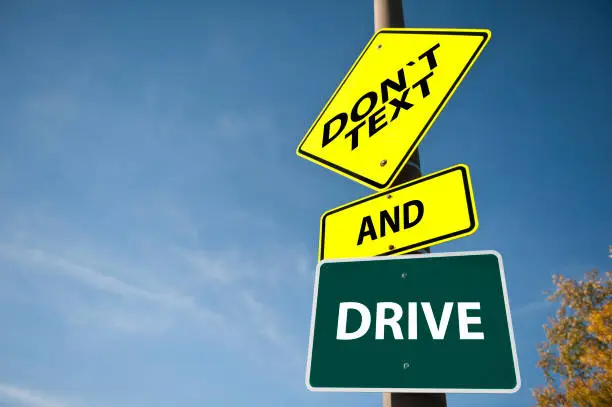 Photo of DON`T TEXT AND DRIVE / Warning sign concept (Click for more)