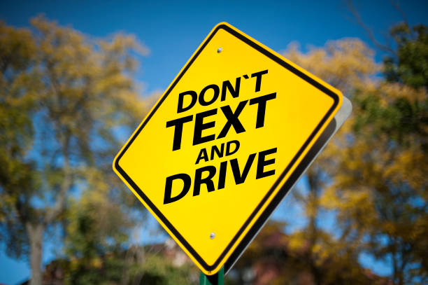 DON`T TEXT AND DRIVE / Warning sign concept (Click for more) stock photo