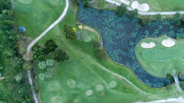 istock aerial view drone shot of golf course. 1009844294