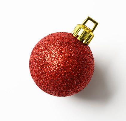 Close-up of red Christmas ball, isolated on white with clipping path.