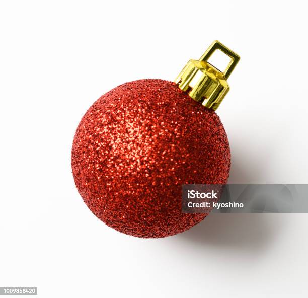Isolated Shot Of Red Christmas Ball On White Background Stock Photo - Download Image Now