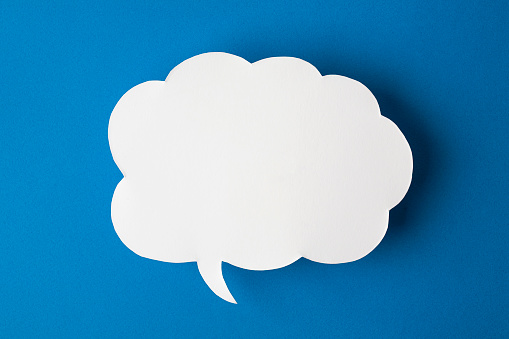 speech bubble on blue background.