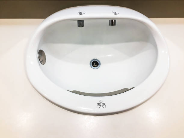 istock Hand basin automatic can be used hand blowers wind and soap at bathroom in modern international airport for service all passengers. 1009861306