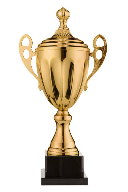 istock one metal sports cup stands on white background, gold cup, isolate 1009861384