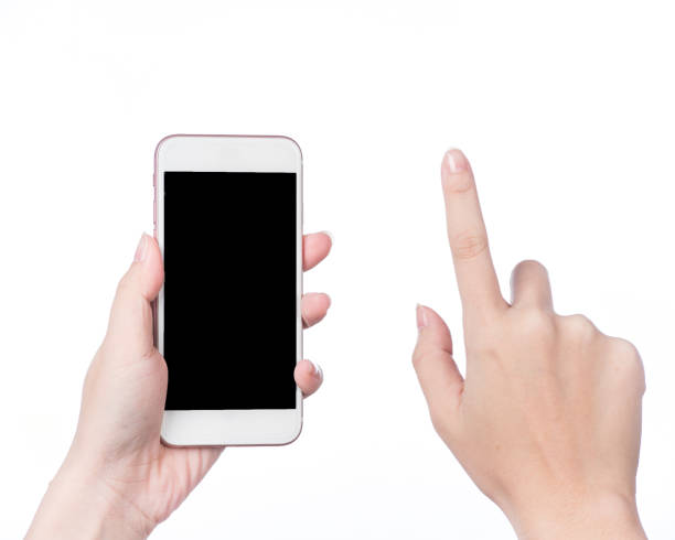 istock Girl's hand holding a modern smartphone and pointing with figer. 1009872076