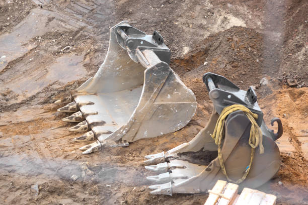 istock Shovels from an excavator on a construction site 1009880516