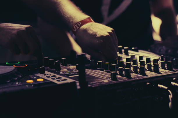 istock dj playing music at party 1009880824