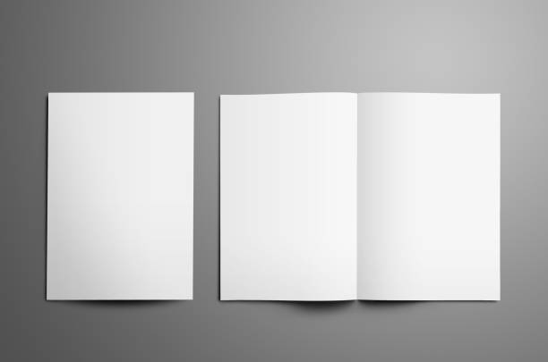 Universal tempalte with two white  A4, (A5) bi-fold brochures isolated on gray background. Universal tempalte with two white  A4, (A5) bi-fold brochures with realistic  shadows isolated on gray background. One booklet is closed the second is open on the spread.  Top of view. pamphlet stock pictures, royalty-free photos & images