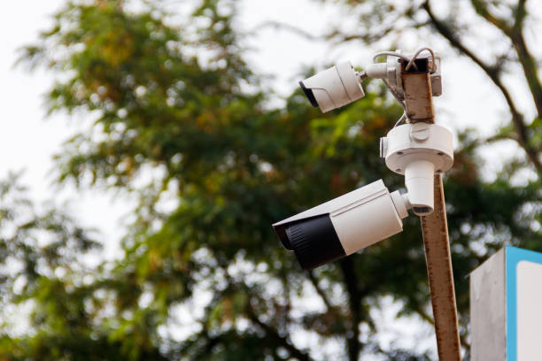 istock Surveillance camera or CCTV system is device to record video for security about shop, store, house, hotel or offices 1009892398