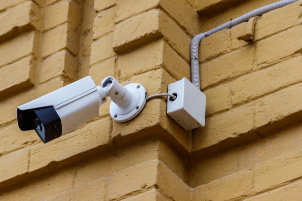 istock Surveillance camera or CCTV system is device to record video for security about shop, store, house, hotel or offices 1009892404
