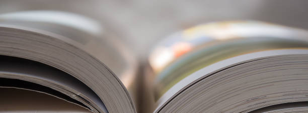 Pages of an open book, light tonality. Closeup.
