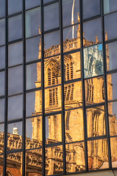 istock Hull Parish Church reflected in glass building opposite 1009906302