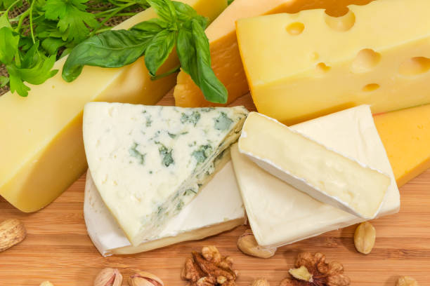 istock Top view of several pieces of different cheese 1009910398