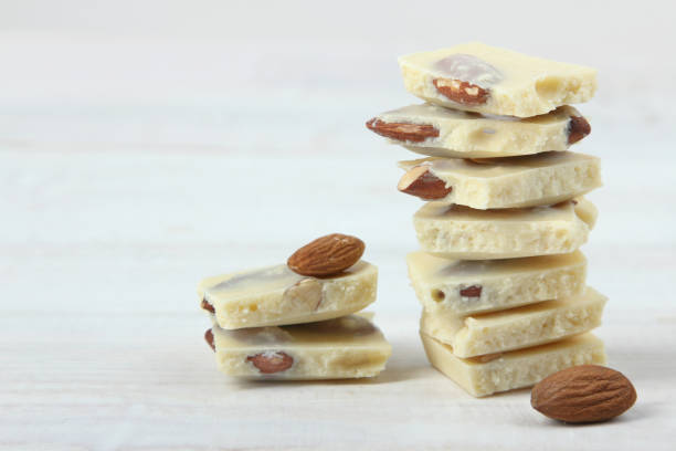 istock Pieces of white chocolate with nuts 1009910574