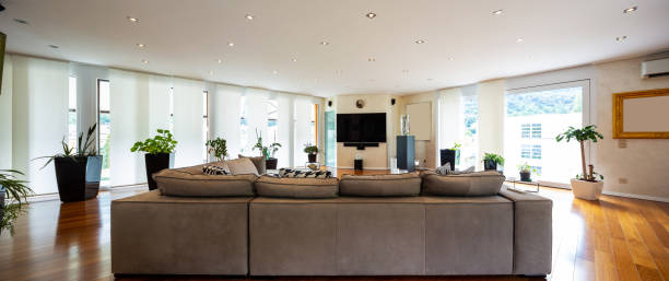 istock Modern living room with large leather sofa 1009912932