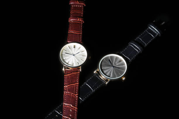 istock Men's accessories with brown leather wallet, belt and watch. 1009913458