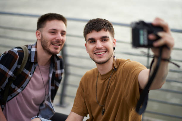 istock Gay couple capturing selfie image 1009930524