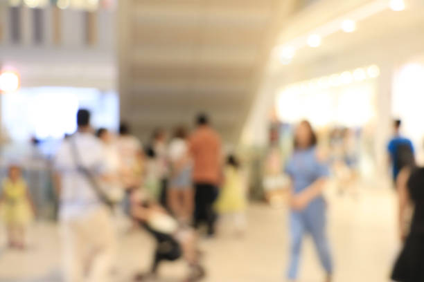 istock Abstract blurred image of shopping mall and people. Abstract backgrounds. 1009948310