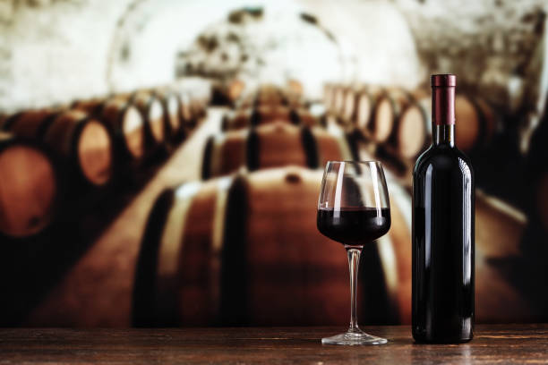 istock a glass and a bottle of wine 1009952614