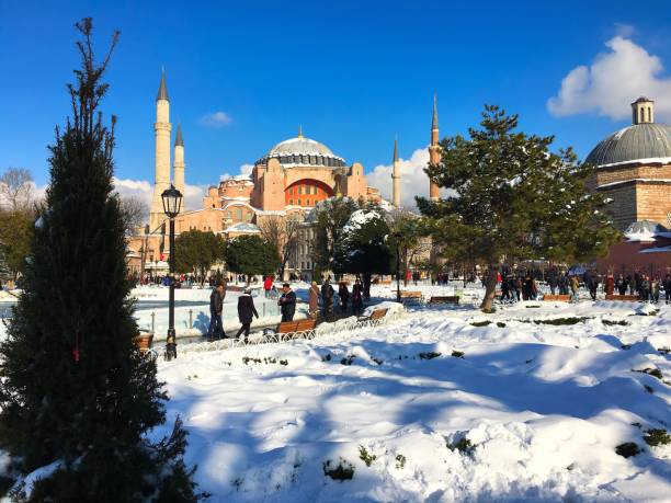 Sultanahmet, Istanbul, Turkey - January 1, 2016: A snowy Hagia Sophia view from Sultanahmet Square in first day of the year.