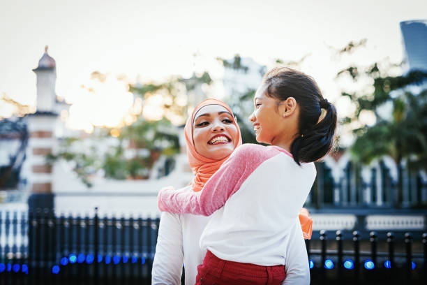 istock Muslim mother and her daughter hugging 1009969810