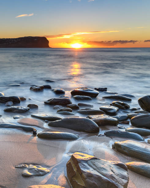 istock Sun's Rising at the Beach 1009970150