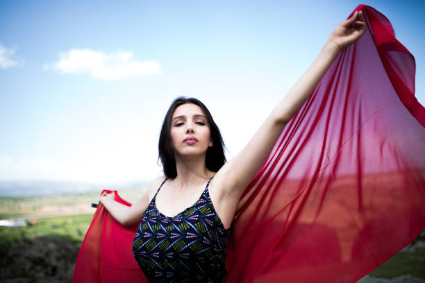 istock a young woman in the spring 1009976258