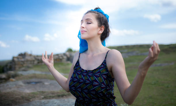 istock a young woman in the spring 1009978456
