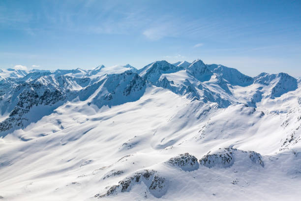 istock Winter snow covered mountain peaks Austrian alps 1009984100
